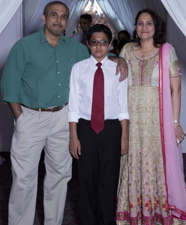 Devinder-posing-with-family-members.jpg