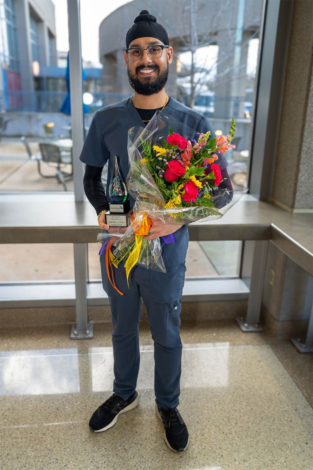 Hardeep-Lally-holding-award.jpg